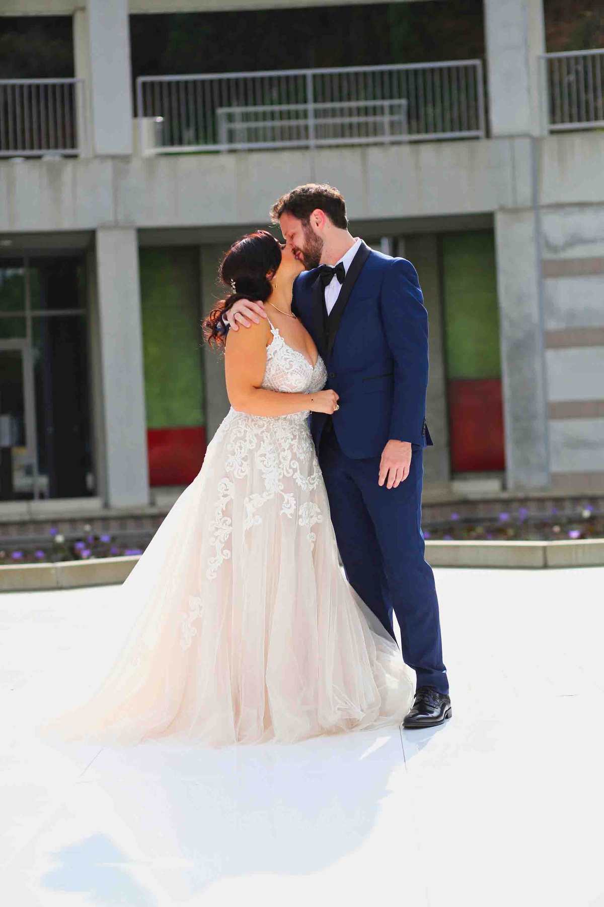Jeff and Michelle's Wedding first look First look wedding kiss