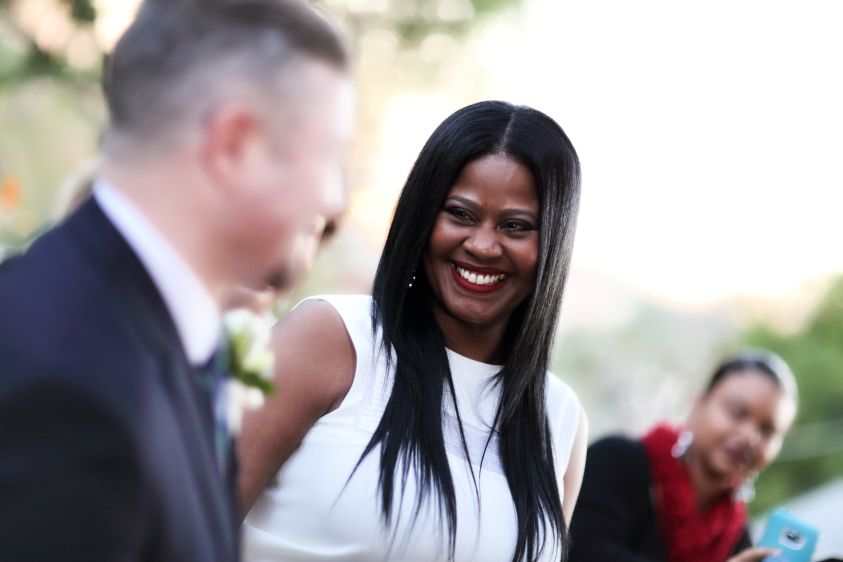Rachelle smiles at Monty. My loving Groom!