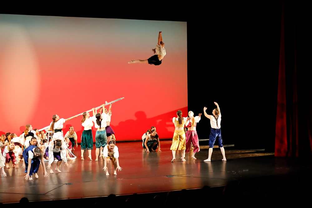 Alex at Dance Creations recital - flying dance photography.  