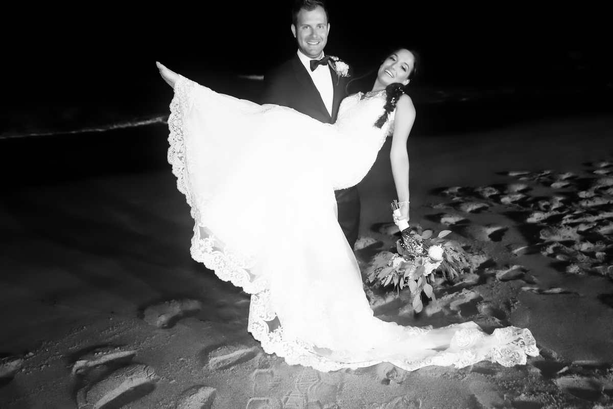 Beach carry of the bride Wedding day on the beach