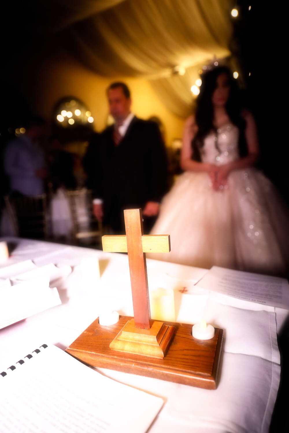 Quinceanera ceremony Quinceanera cross.jpeg