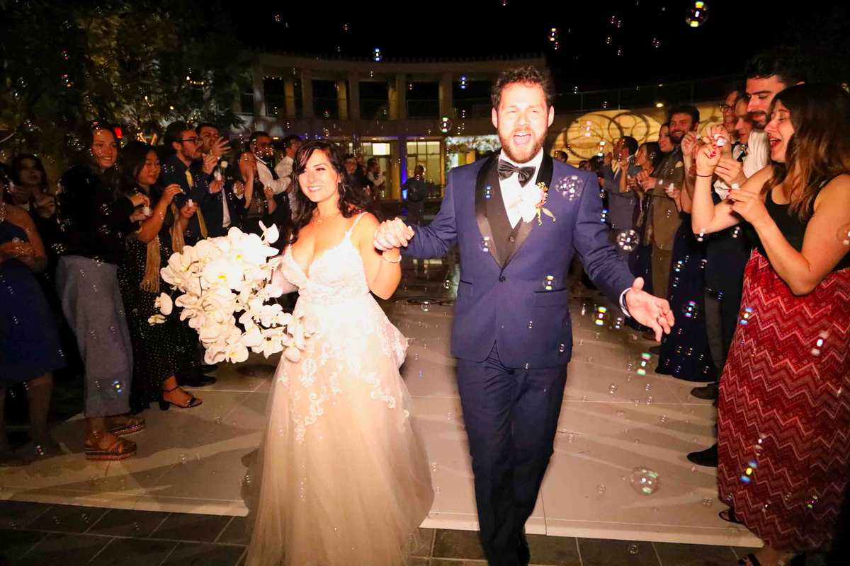 Grand bubble sendoff for Michelle and Jeff Wedding exit bubbles
