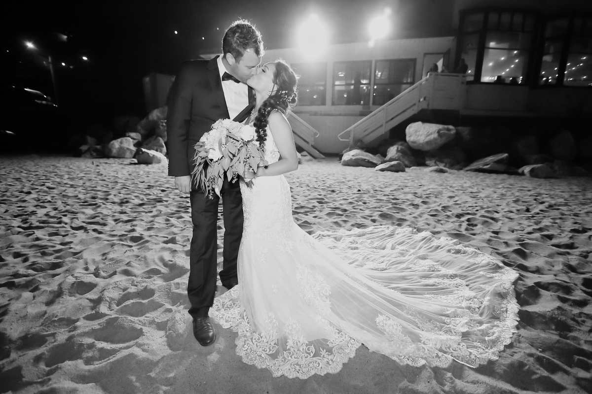 Beach Wedding Photography Kissing on the beach