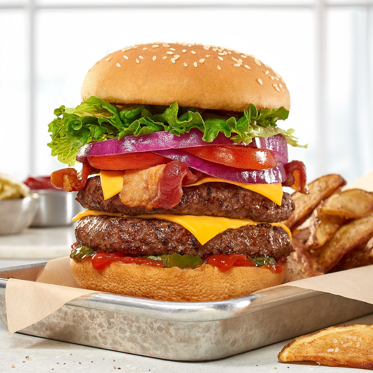 Commercial food photography of a cheeseburger by Dallas photographer Rusty Bradford. Commercial food photography of a cheeseburger by Dallas photographer Rusty Bradford.