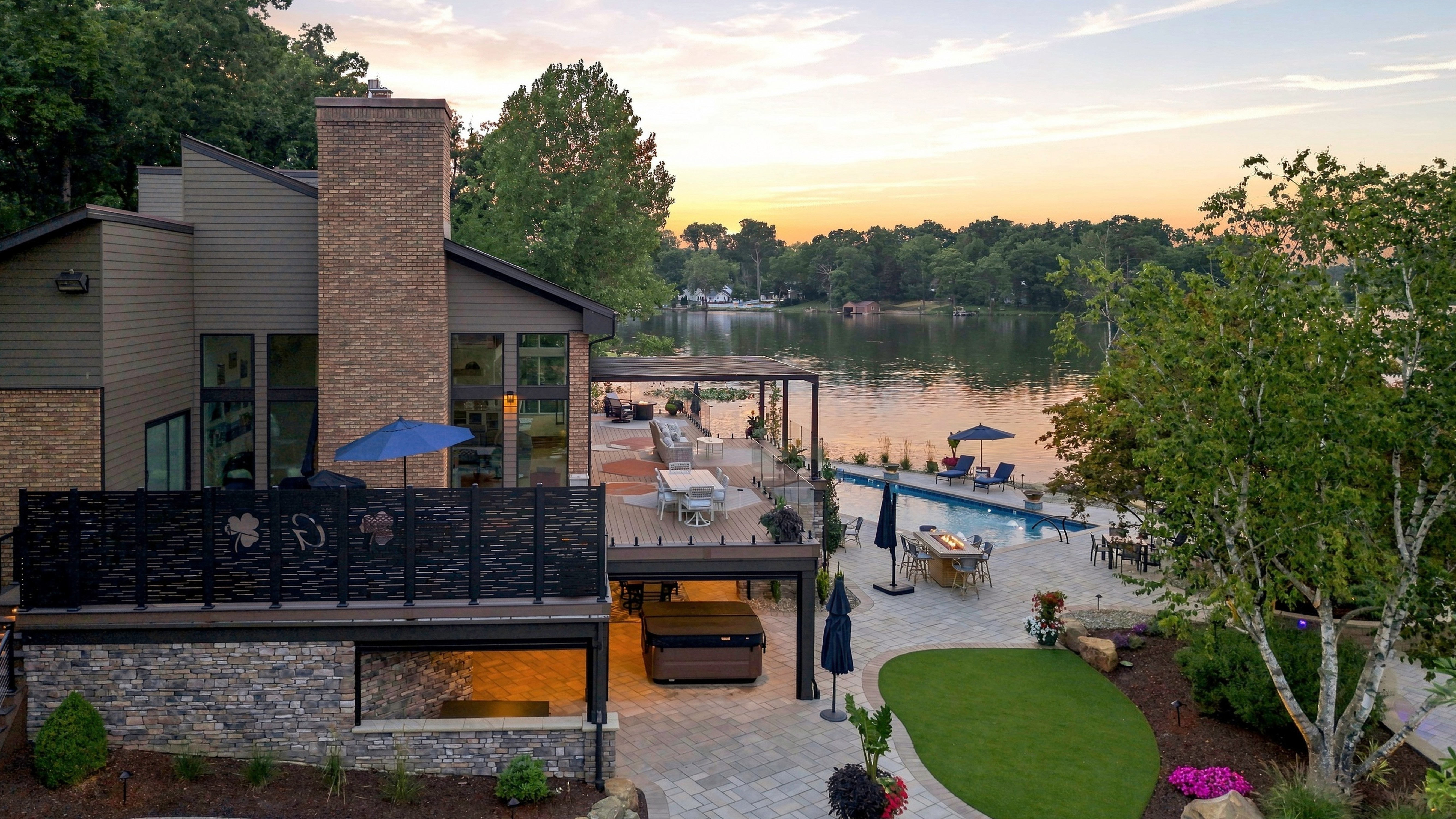 Aerial drone photo showing the deck, patio, and full backyard layout of a home in Dublin, Ohio, giving buyers a clear sense of outdoor space and how it connects to the house.