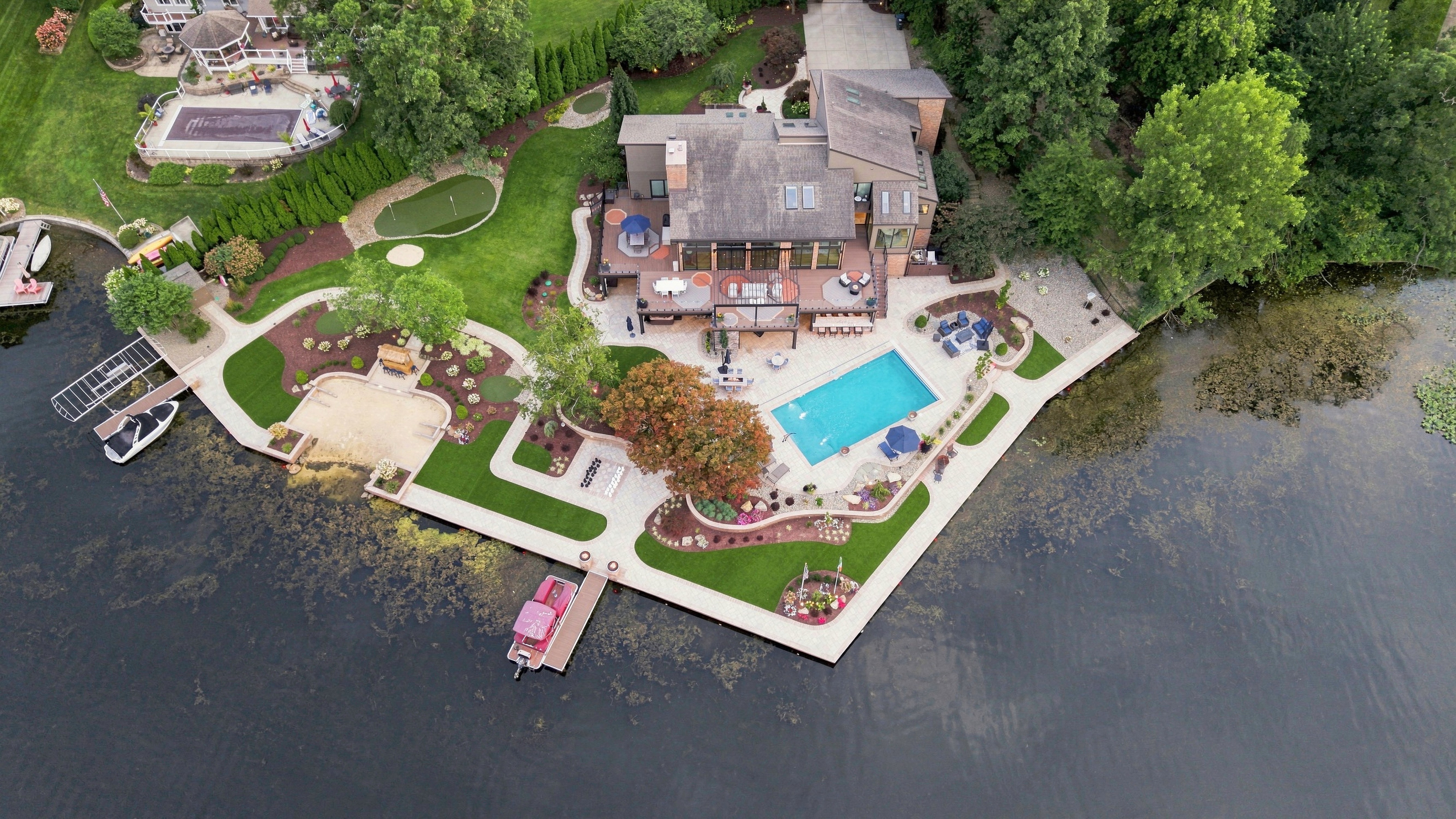 erial photography showing lakefront home, dock, and water access near Westerville , Ohio