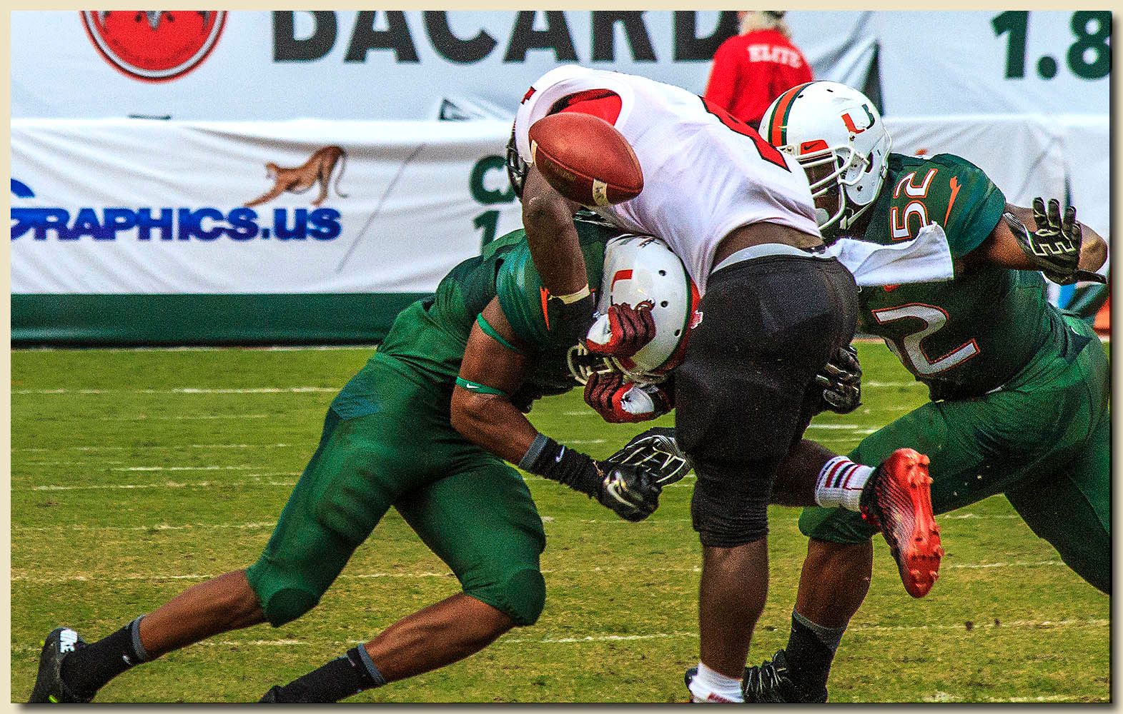 Miami Hurricanes vs Arkansas State Red Wolves at Sun Life Stadium  09-13-2014 Fumble Deon Bush (2), Denzel Perryman (52) Tacklers