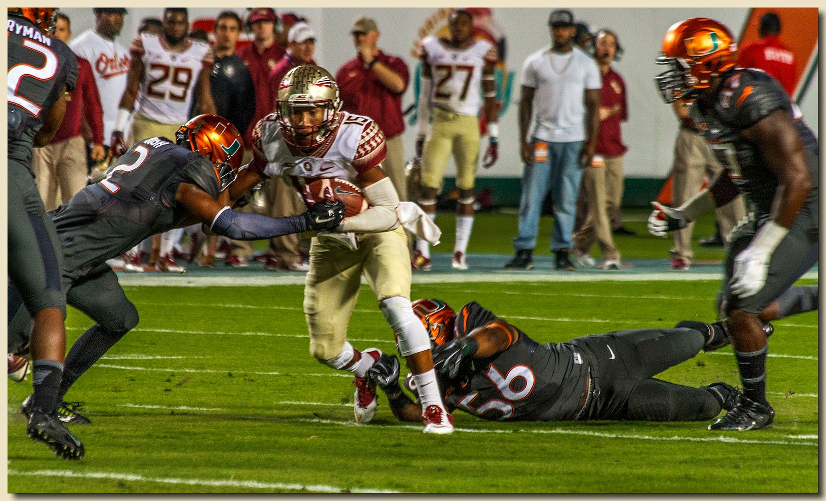 Miami Hurricanes vs Florida State Seminoles at Sun Life Stadium  11-15-2014 Deon Bush (2) and Raphael Kirby (56) Tacklers