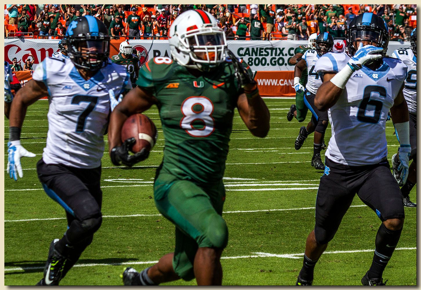 Miami Hurricanes vs North Carolina Tar Heels at Sun Life Stadium  11-01-2014 Duke Johnson (8) On His Way to a Touchdown