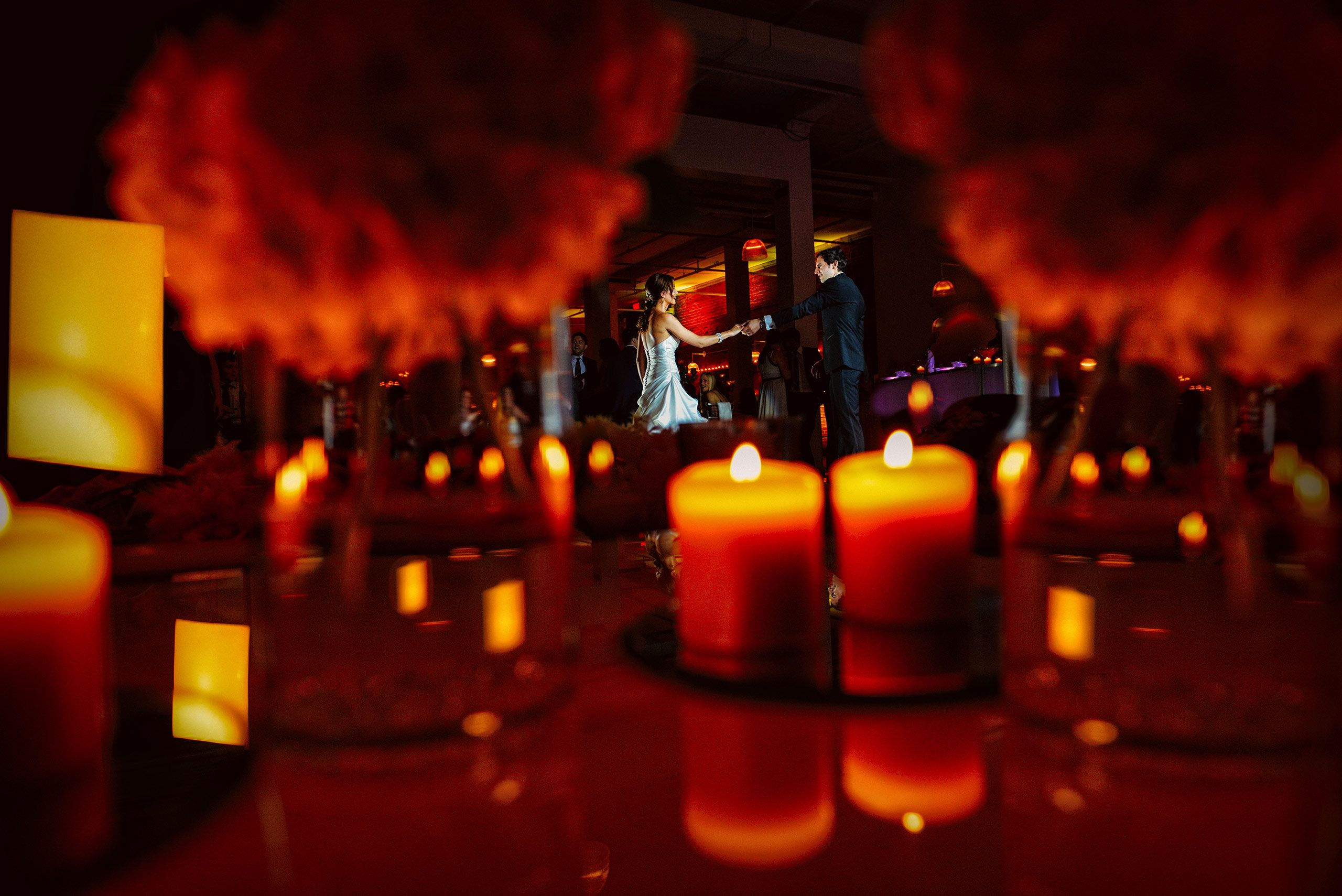 Bride and groom on the dance floor for their first dance at Entrepôts Dominion