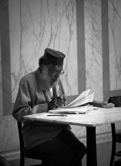 Man at Study With Pen and Paper - Chicago   2015