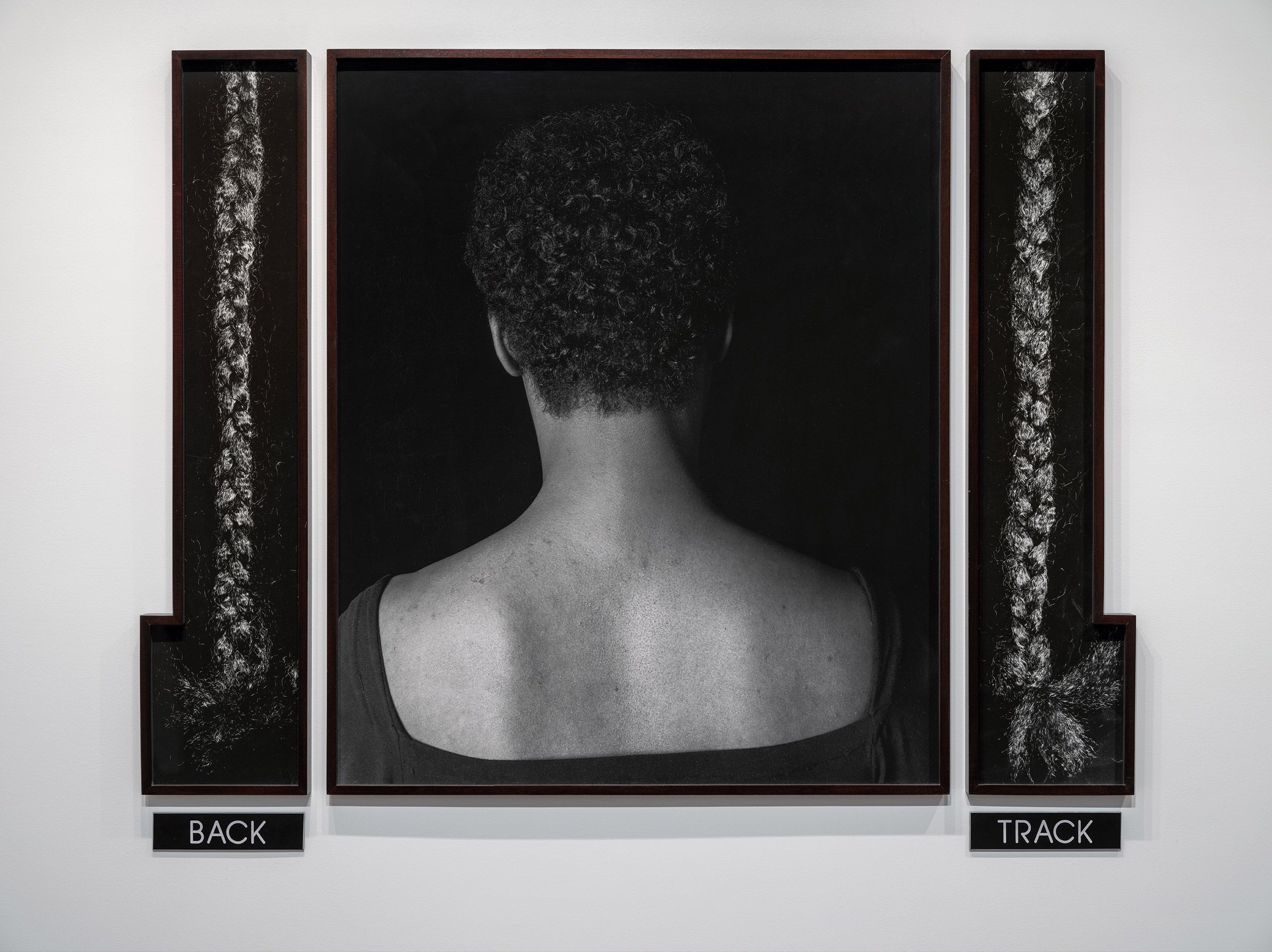 3 silver gelatin prints, 2 engraved plastic plaques - Overall: 48 7/8 x 62 9/16 x 1 11/16 in (124.1 x 158.9 x 4.3 cm) 2 Tracks, 1990
