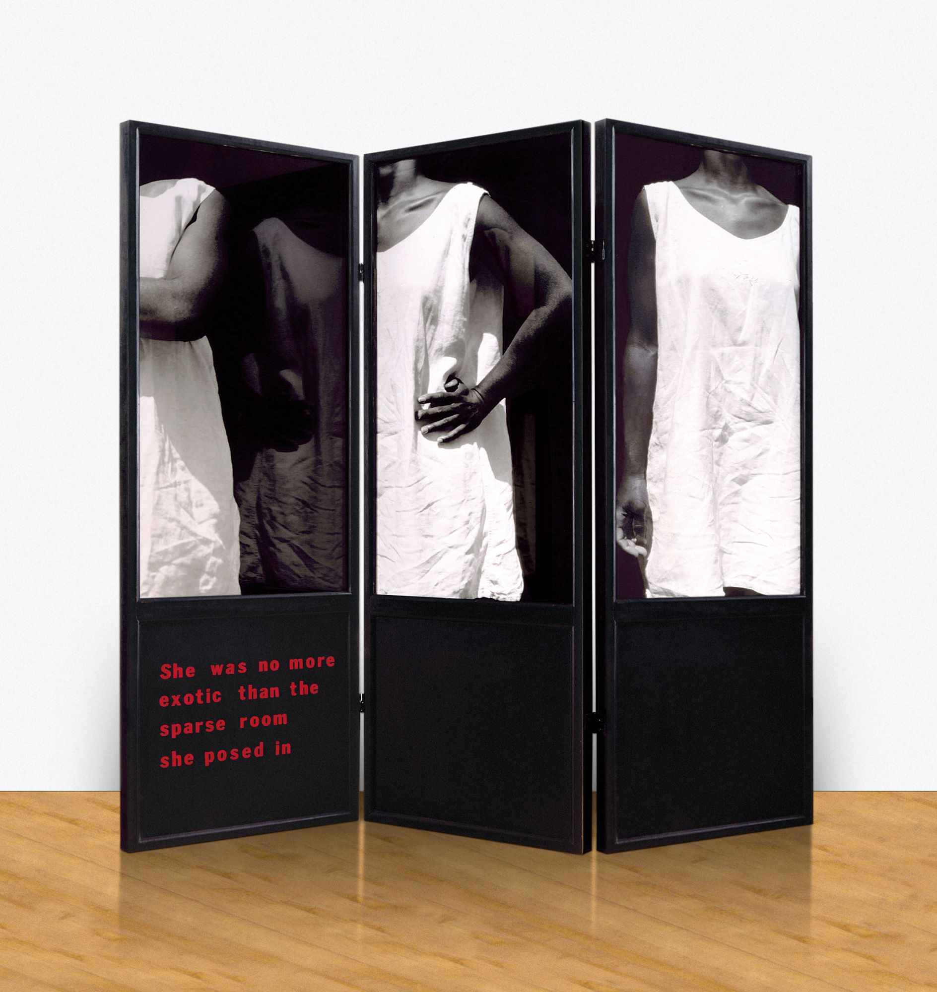 1 wooden accordion screen, 3 silver gelatin prints, vinyl lettering - Overall: 73 1/2 x 60 x 22 in (186.7 x 152.4 x 55.9 cm), "In works such as Screen 4 (1986), a freestanding screen whose three panels bear black-and-white photographs of a standing woman, Simpson calls attention to the emphasis on sexuality so often found in representations of black women by simply omitting it. Standing with arms crossed, or at her sides, or on her hips, and wearing the ubiquitous white shift, here baggy and wrinkled, Simpson's model chooses neither to please nor attract. The gap between her reality and the desire for pleasure inherent in the male gaze is also alluded to in the words inscribed on one of the panels: "She was no more exotic than the sparse room she posed in."" -Bonita McLaughlin Screen 4, 1986