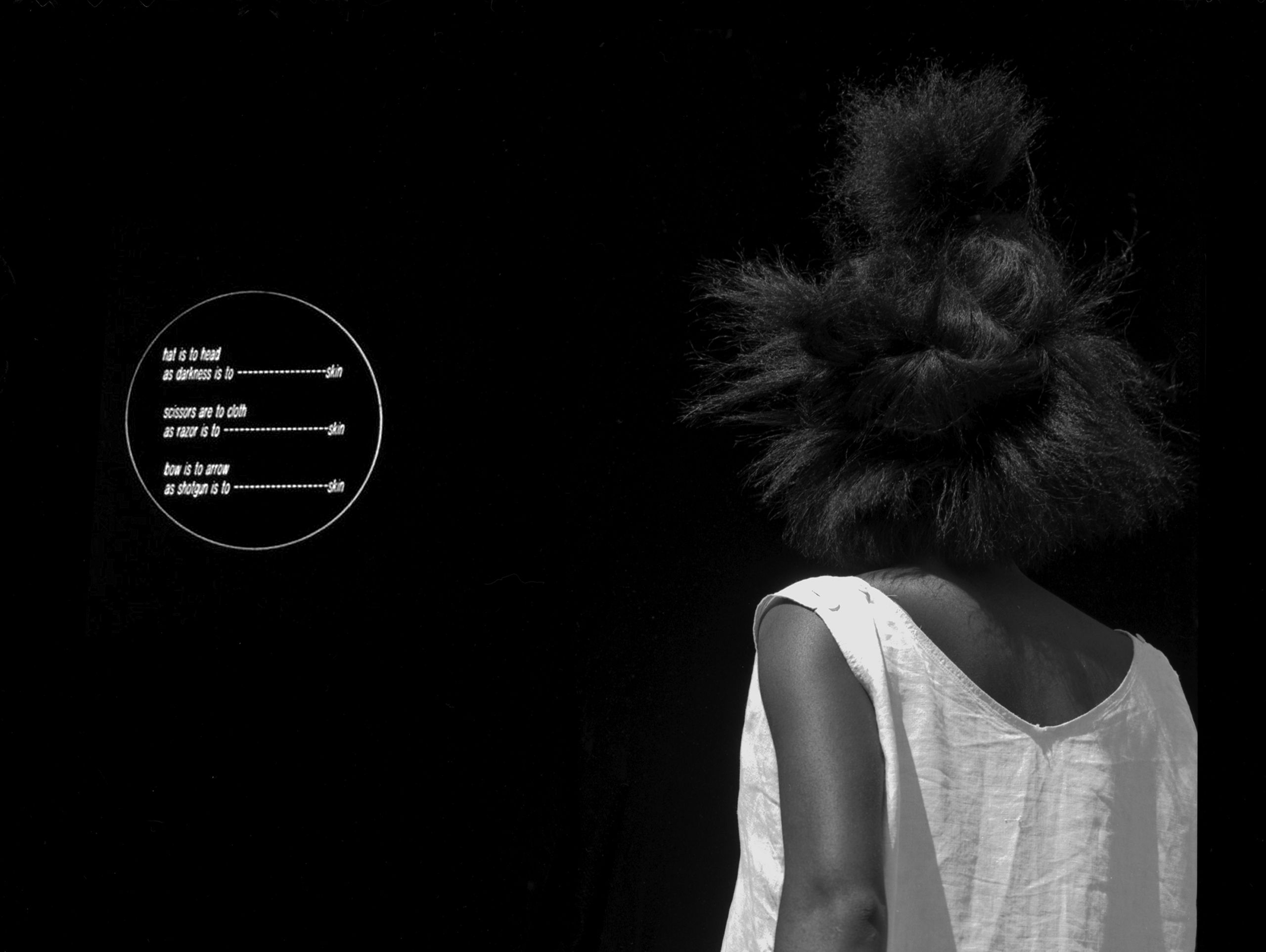 Silver gelatin print, 1 engraved plastic plaque - Overall: 36 x 48 x 2 in (91.4 x 121.9 x 5.1 cm), Plaque: 10 in diameter (25.4 cm diameter), "Completing the Analogy explores the affiliations of language and power by playing with the rules of logic and making nonsense of reason. Usually analogies are guided by reciprocal relations between similar things, or by resemblance between things. In this case, the analogies disrupt inductive reasoning and interrogate the ways in which similarity is constituted. Completing the Analogy examines the coercive reasoning that institutes relations of similarity or reference. The correspondence established between objects and between word and object is achieved only at the cost of violence." -Saidiya V. Hartman Completing the Analogy, 1987