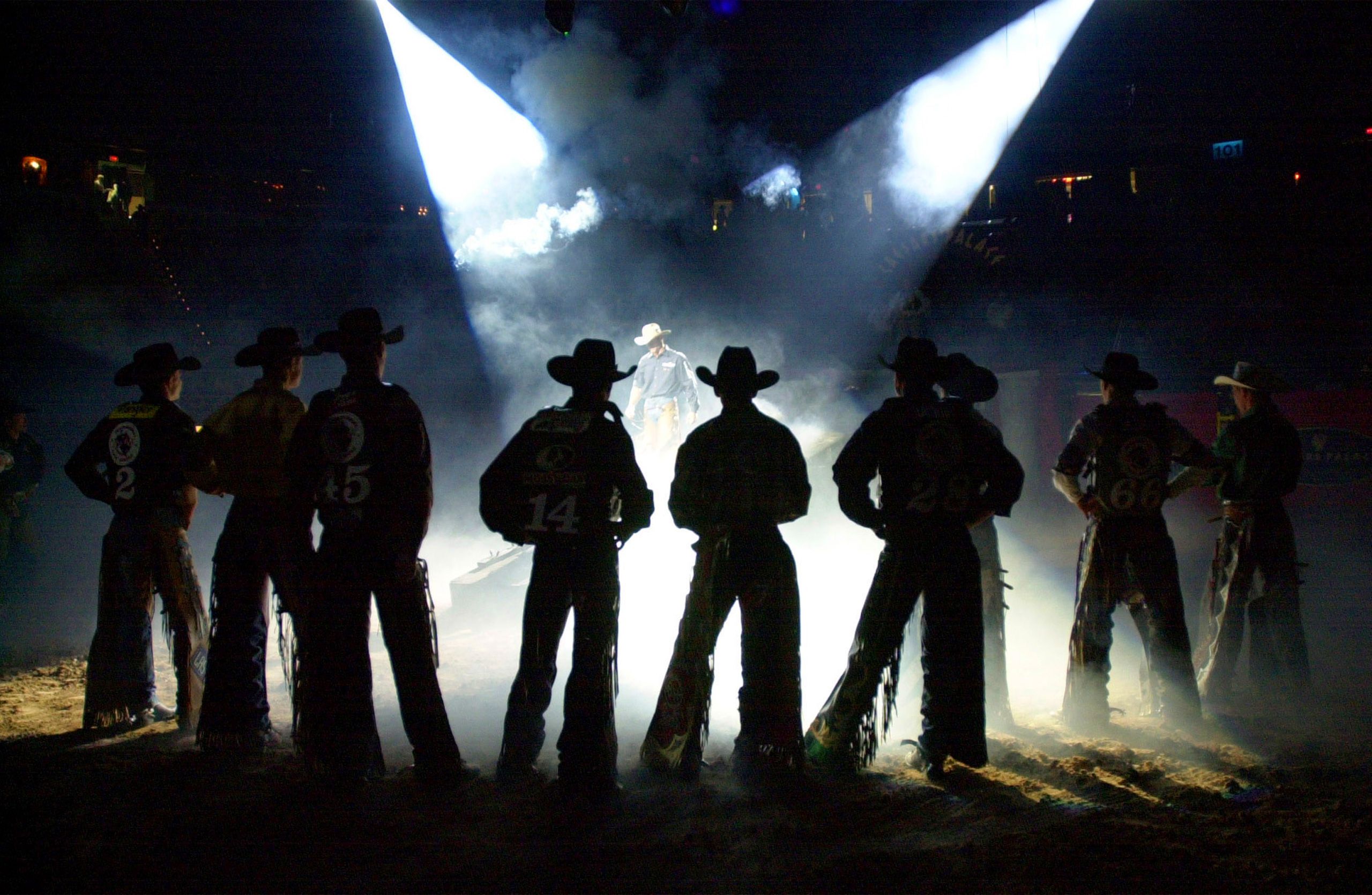 Contestants are introduced at the beginning of the third round of the Professional Bull Riders World Championships in Las Vegas, Saturday, Oct. 28, 2000.  Professional Bull Riders World Championships