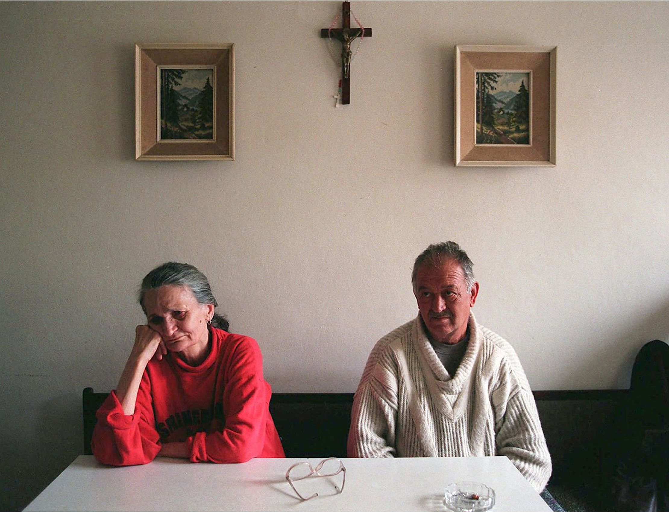 The pain of the Bosnian war is seen in the eyes of a Catholic couple in Zenica, Bosnia in 1997. Bosnian War