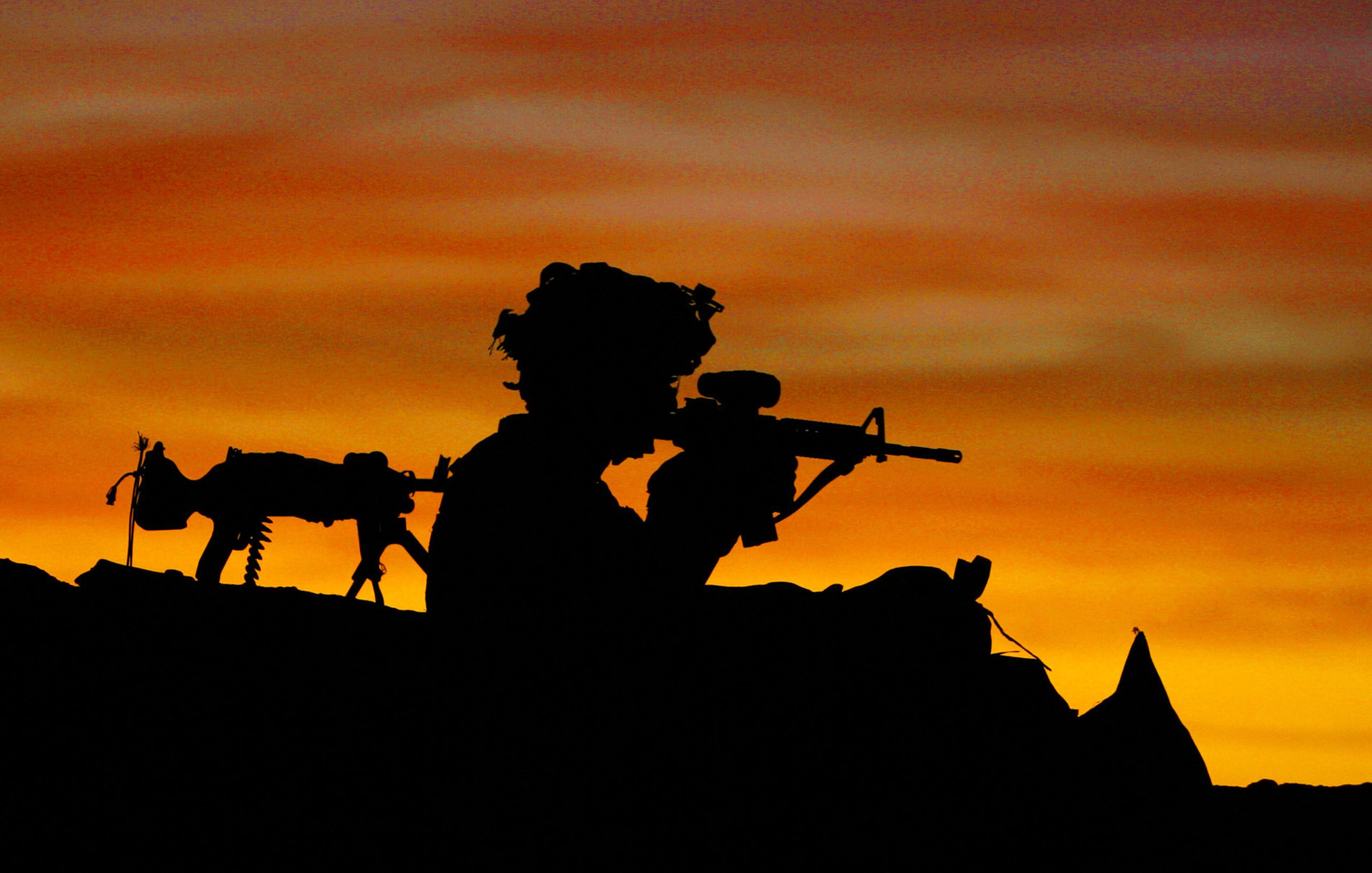 Spc. Christopher Compagnone, of Company A, 3rd Brigade Special Troop Battalion, 10th Mountain Division, pulls guard duty at a strong point during an air assault operation with the 1st Infantry Division on December 9, 2011 in Hajikhell, Afghanistan.  Hajikhell Afghanistan