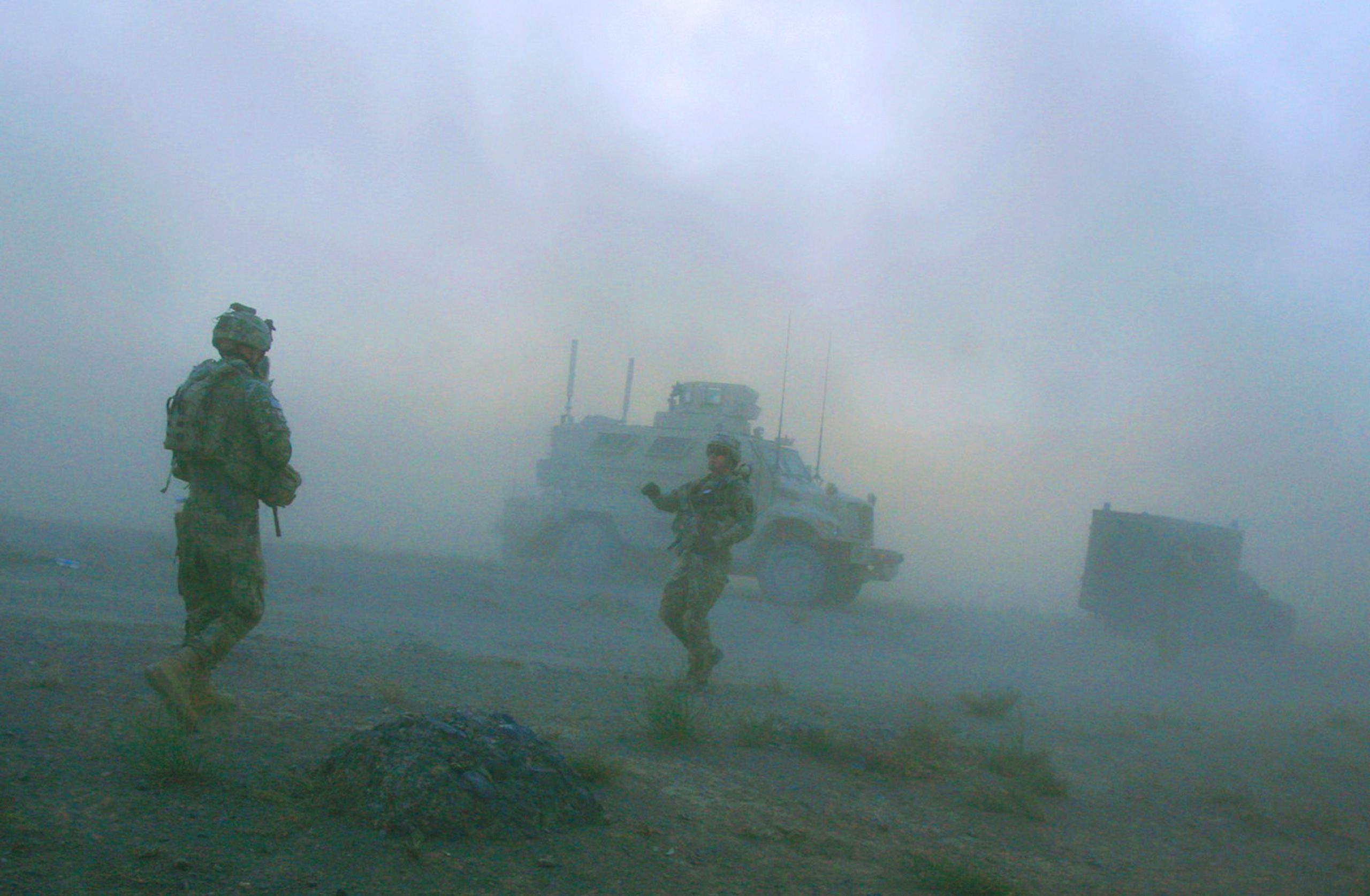 Pathfinders with Company F, 4th Battalion, 101st Aviation Regiment, 159th Combat Aviation Brigade, 101st Airborne Division, link up with their vehicles after being dropped in by Chinook helicopters for a mission on September 23, 2011 in Zabul province, Afghanistan.  101st Airborne Division Pathfinders