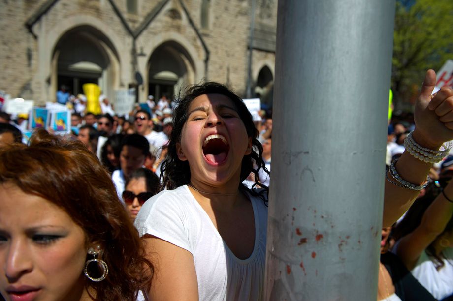 Paulina Bravo screams "Yes we can" in Spanish during a rally against immigration legistlation held outside the Georgia Capitol. Photographed for the New York Times. IMMIGRATION PROTEST