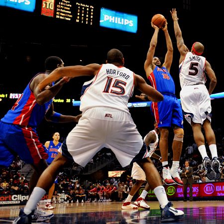 The Detroit Pistons Rasheed Wallace takes a shot over the Atlanta Hawks Josh Smith. NBA BASKETBALL