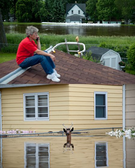 Scenes from the historic flooding of Minot, ND in the spring of 2011, due to the rising Souris River, where thousands were chased from their homes. Photographed for the New York Times. HISTORIC FLOODING