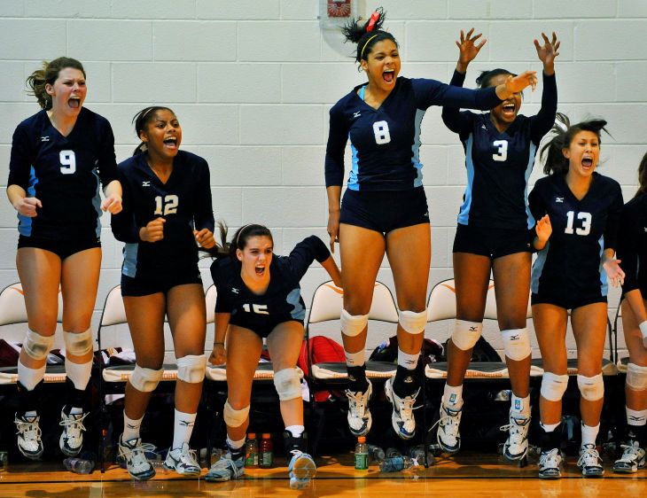 Girls high school volleyball bench strength. CHEERING SECTION