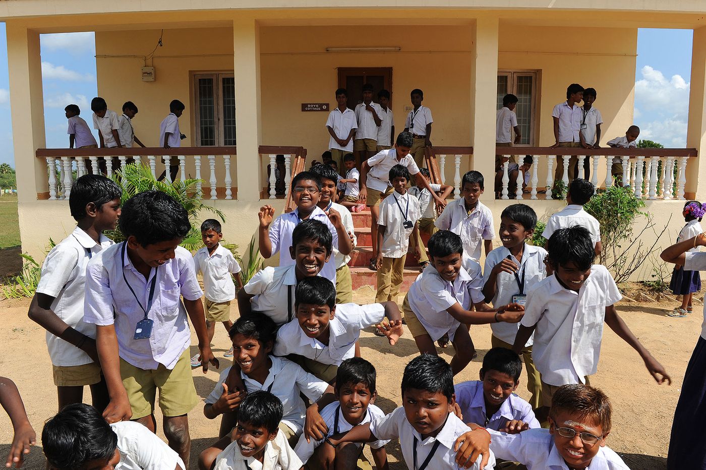 Shoe Nearby village students with their new shoes