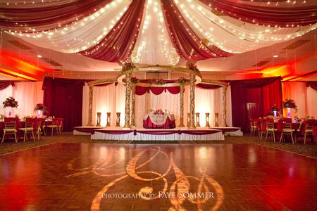 Red and gold Indian wedding reception at the Dayton Marriott Red and gold Indian wedding reception at the Dayton Marriott