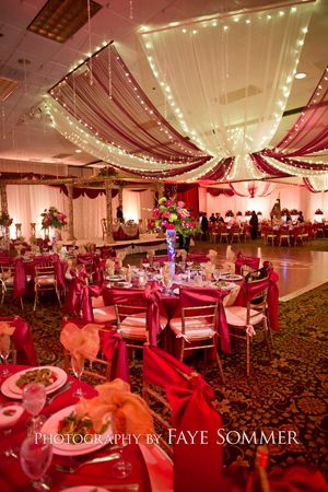Red and gold Indian wedding reception at the Dayton Marriott Red and gold Indian wedding reception at the Dayton Marriott
