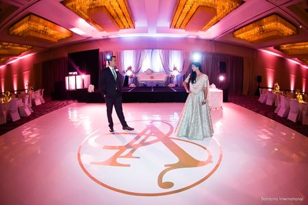 Indian wedding reception with printed, branded dance floor Indian wedding reception with printed, branded dance floor