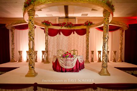 Red and gold Indian wedding reception at the Dayton Marriott Red and gold Indian wedding reception at the Dayton Marriott