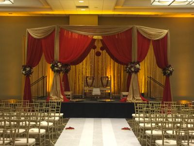 Indian-wedding-ceremony-mandap-furniture-dayton-cincinnati-columbus-unlimited-events_0033.jpg Indian wedding ceremony decor with gold and red mandap