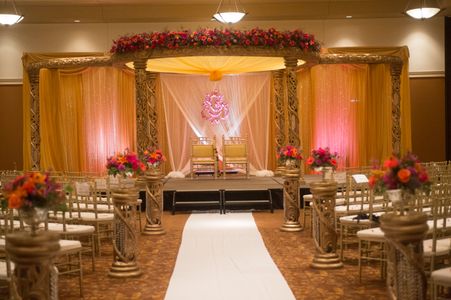 Indian wedding ceremony decor with mandap and backdrop Indian wedding ceremony decor with mandap and backdrop