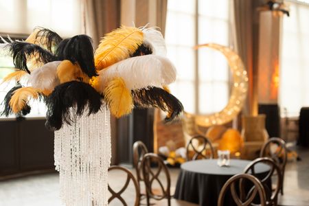Gatsby, Roaring 1920's party theme with gold, black, and feathers Gatsby, Roaring 1920's party theme with gold, black, and feathers