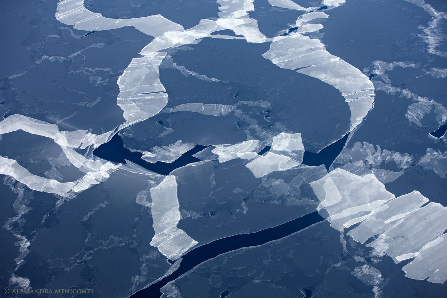 Very thin and fractured sea ice covering the ocean in late March near the coast of southeast Greenland.