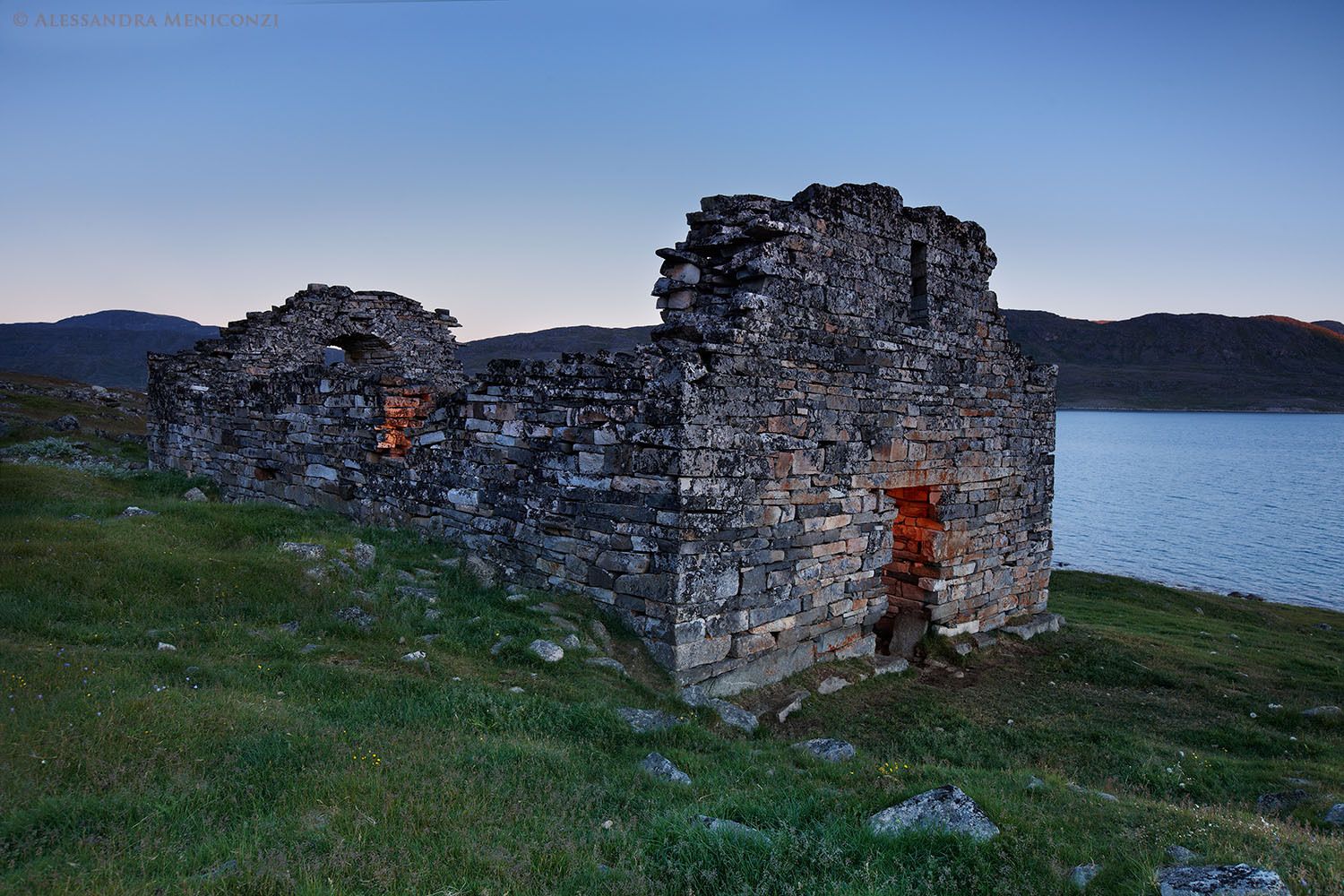 The ruins of a Norse church at the edge of the Qaqortukulooq fjord (Hvalsey) in South Greenland.