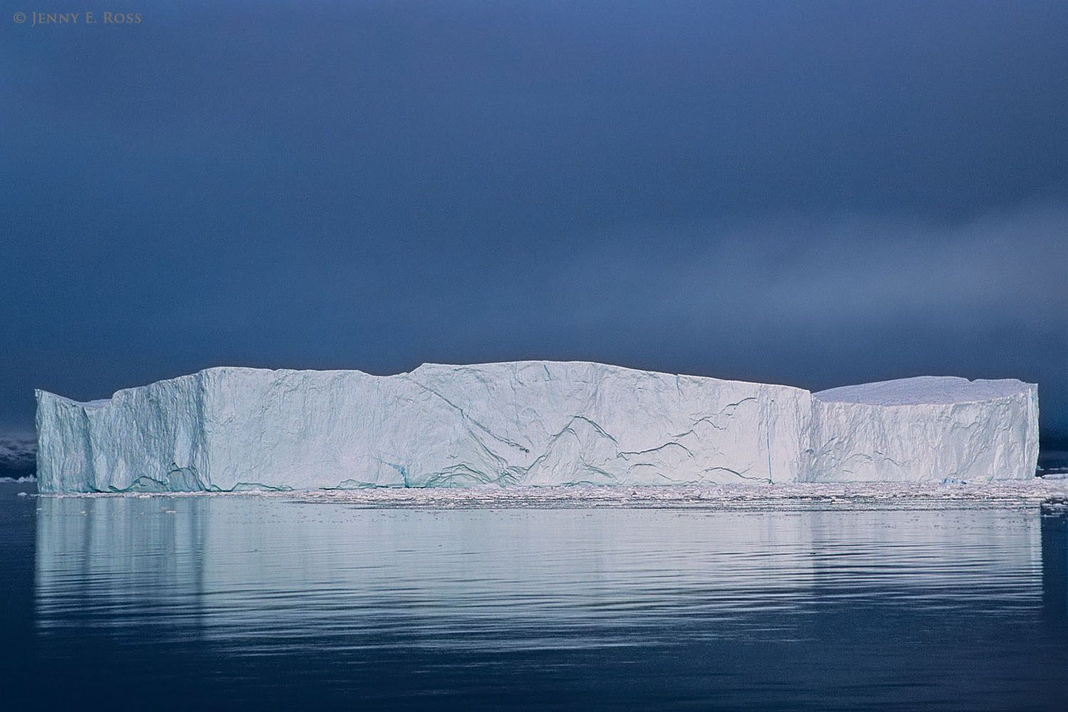 A large tabular iceberg in Rodefjord, within Scoresby Sund, East Greenland.