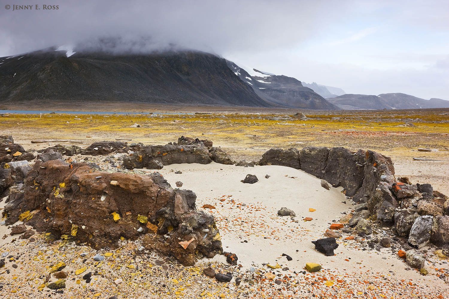 Remains of a 17th century blubber oven (including concretized chunks of whale blubber) at Smeerenburg on Amsterdamoya, in the Svalbard Archipelago, Norway.