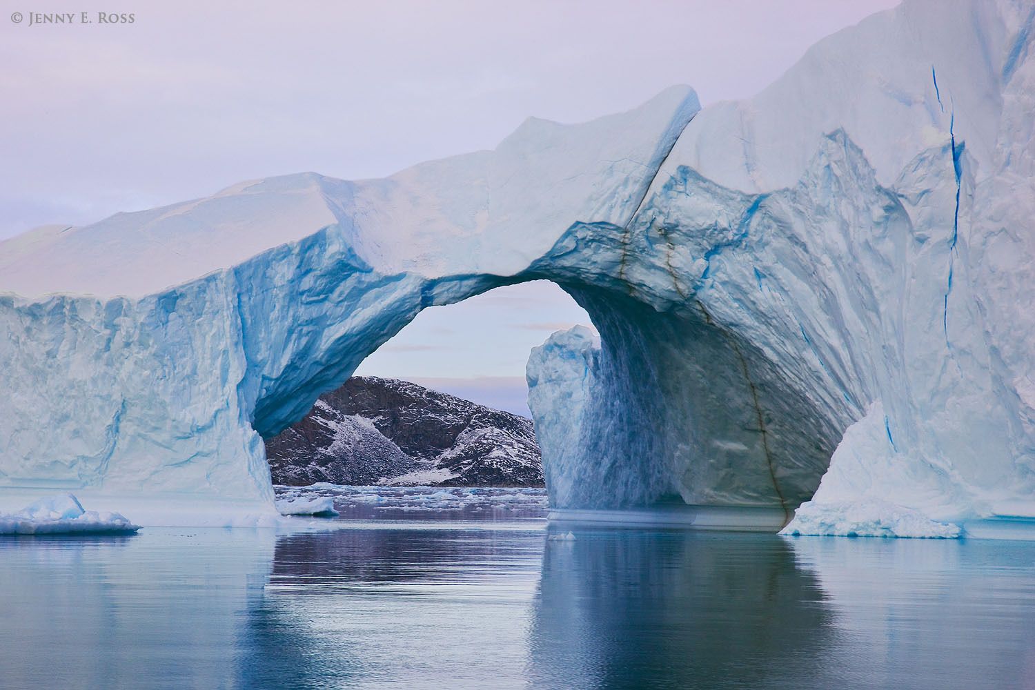 An arched iceberg near Eqip Sermia Glacier in Disko Bugt (Disko Bay), West Greenland.