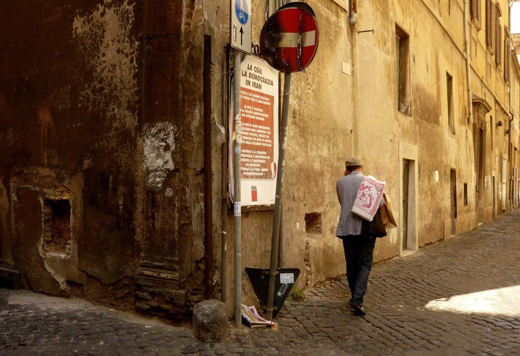 Rome - Italy.  An old wall, graffiti and all.