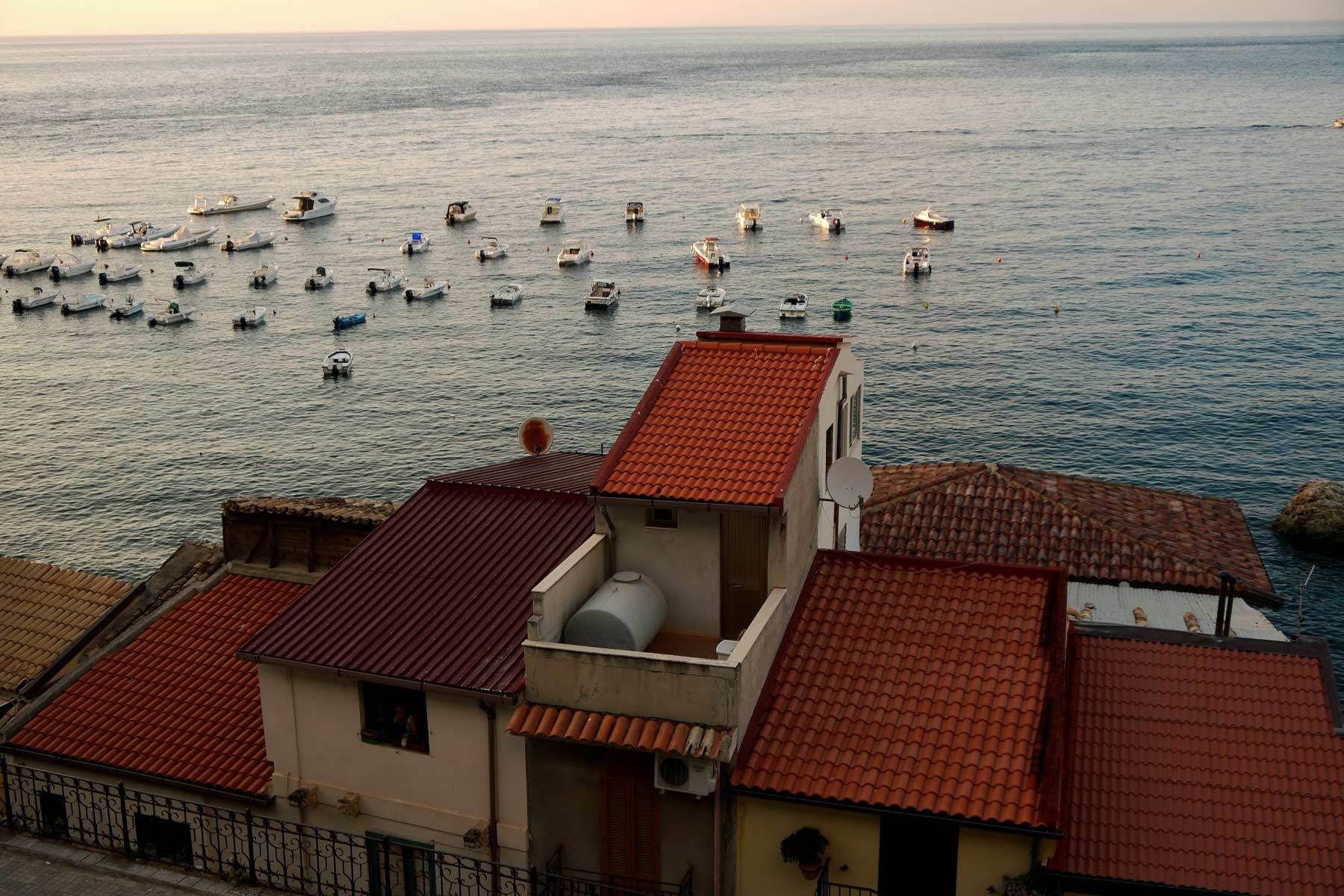 Italy and its sea at sunset.