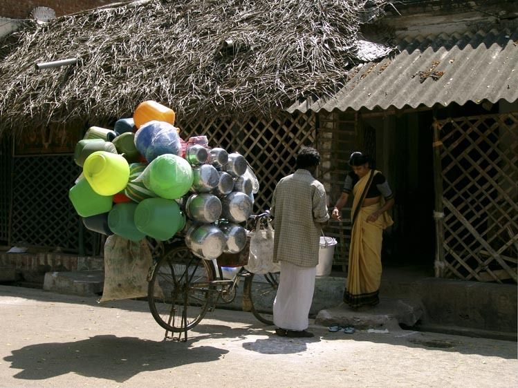 Door to door salesman on bicycle
