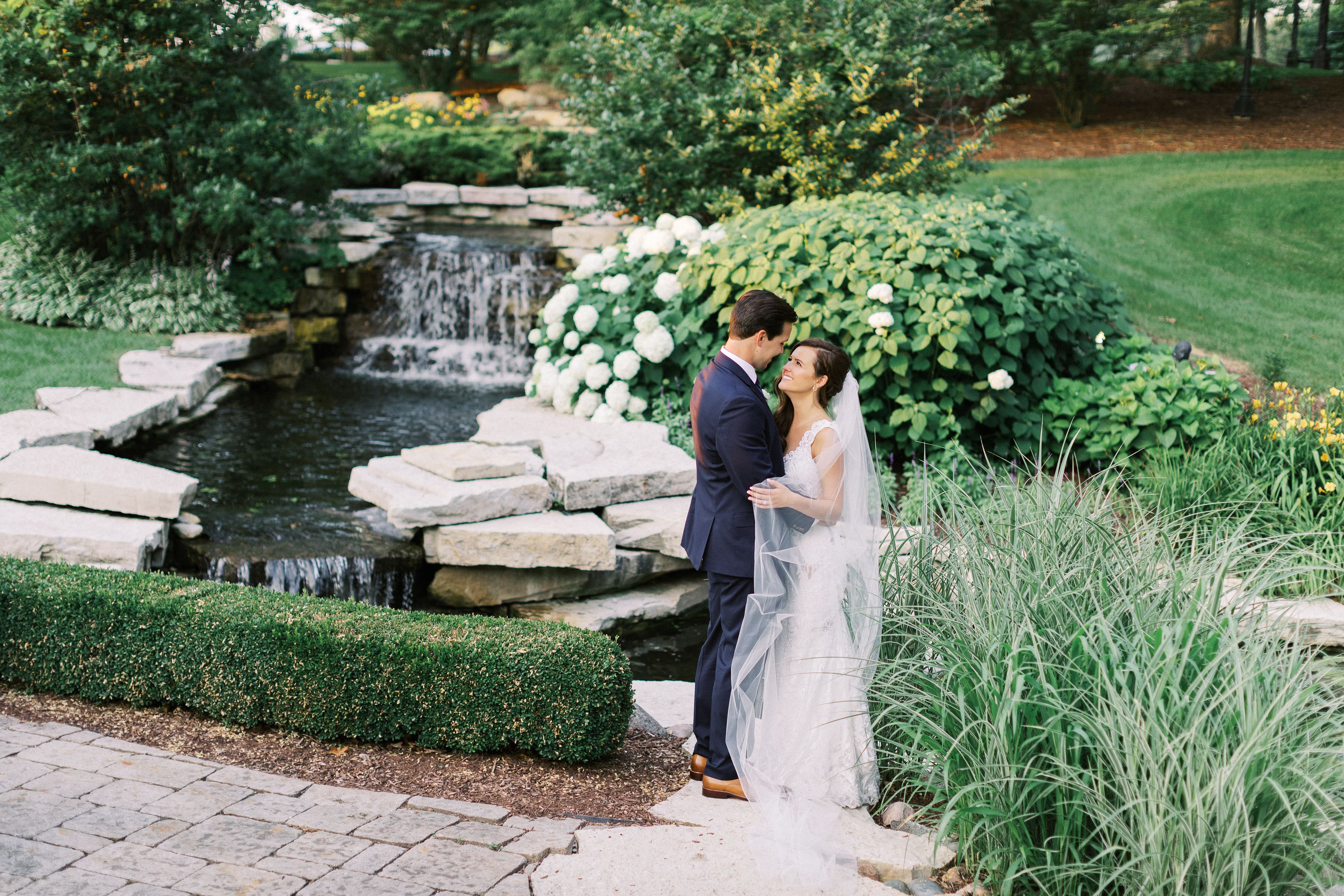 waterfall bride wedding flowers