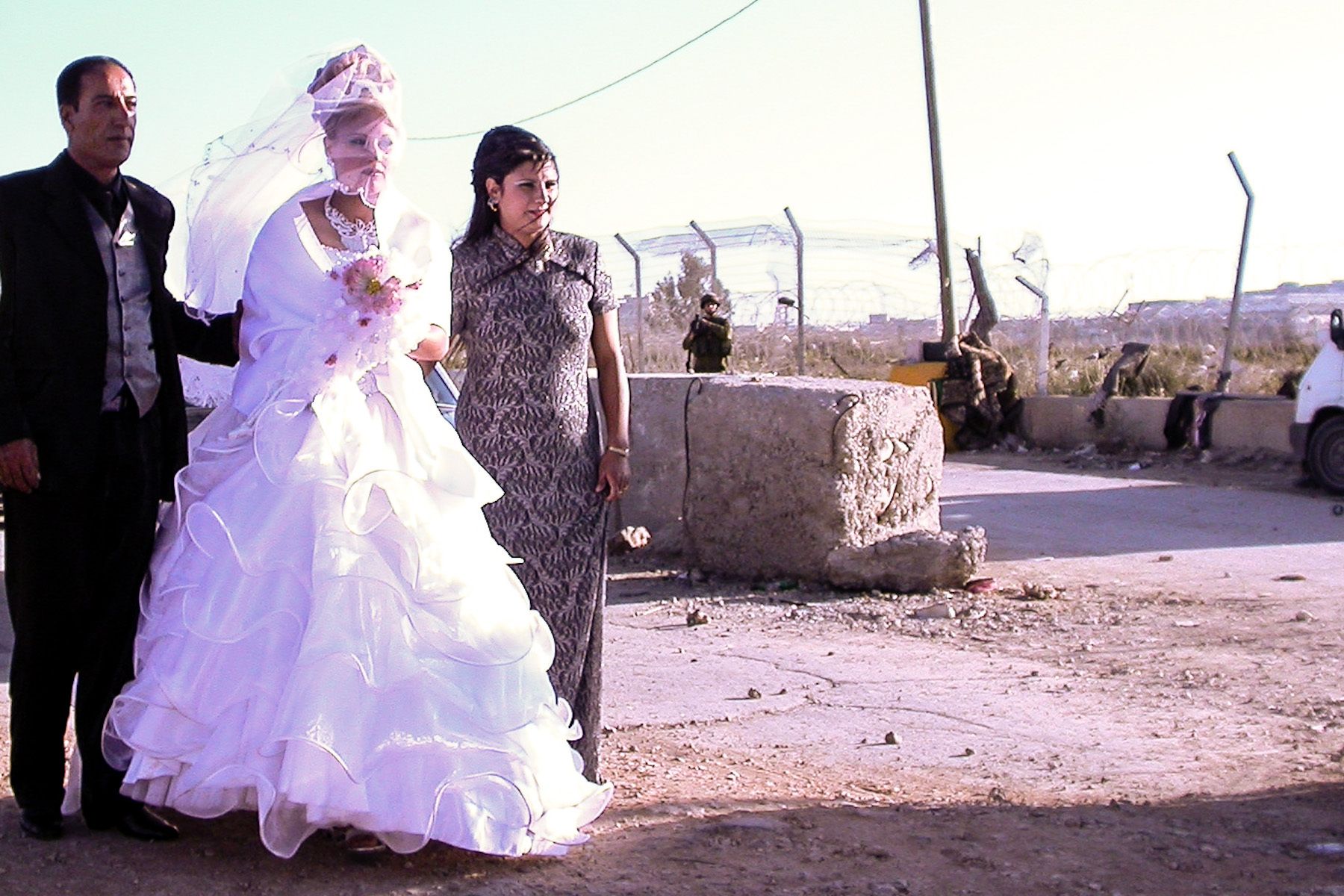 Wedding Party Crossing the Checkpoint