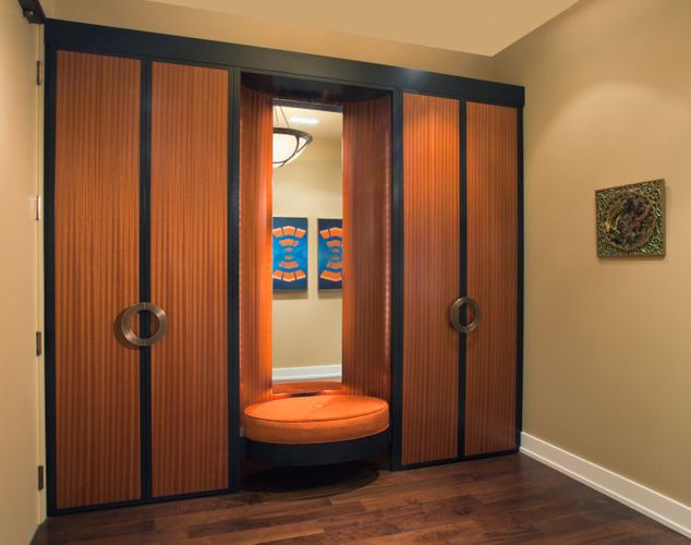 FRONT ENTRY CLOSET Project# 849Ribbon SapeliEbonized Mahogany Upholstered SeatBronzed Pull