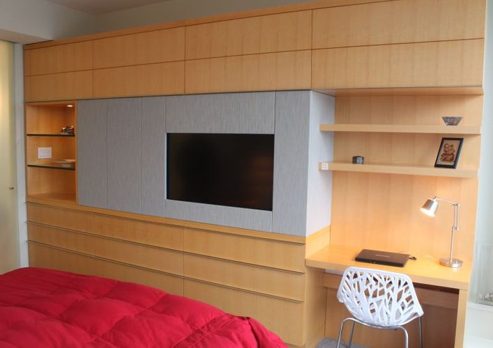 BEDROOM WALL UNIT DESIGN Project# 1168Incorporates TV, AV Equipment, Desk, Dresser, Display & StorageQuarter Cut MapleAccoustically Transparent Fabric