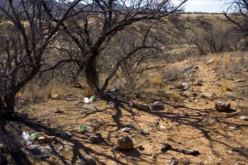The shelter of trees alongside a well worn path is a stopping point for migrants. Most travel is done at night, out of the glaring sun. Campground