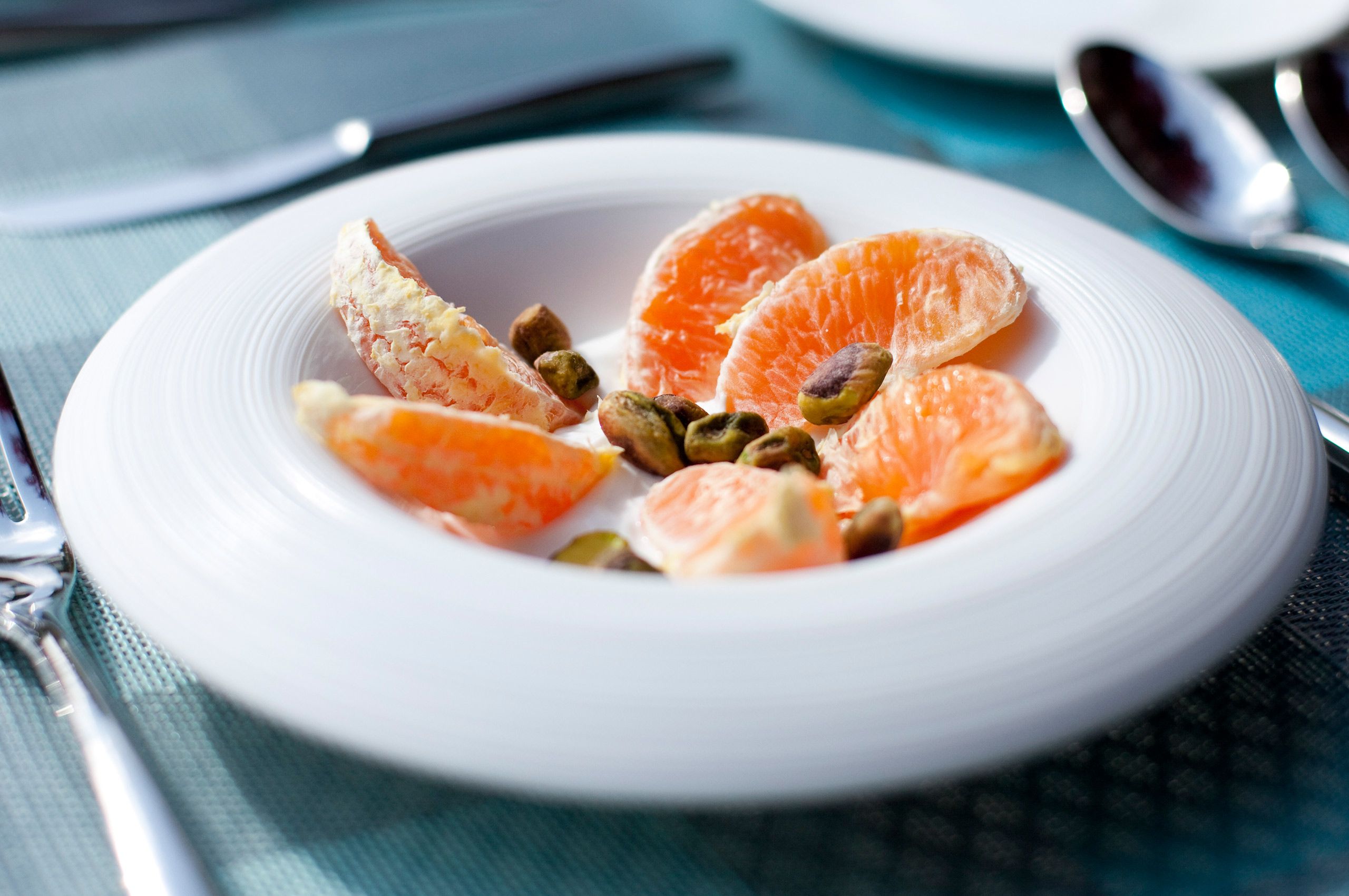 Sliced oranges over yogurt breakfast - English Meadows Inn.jpg