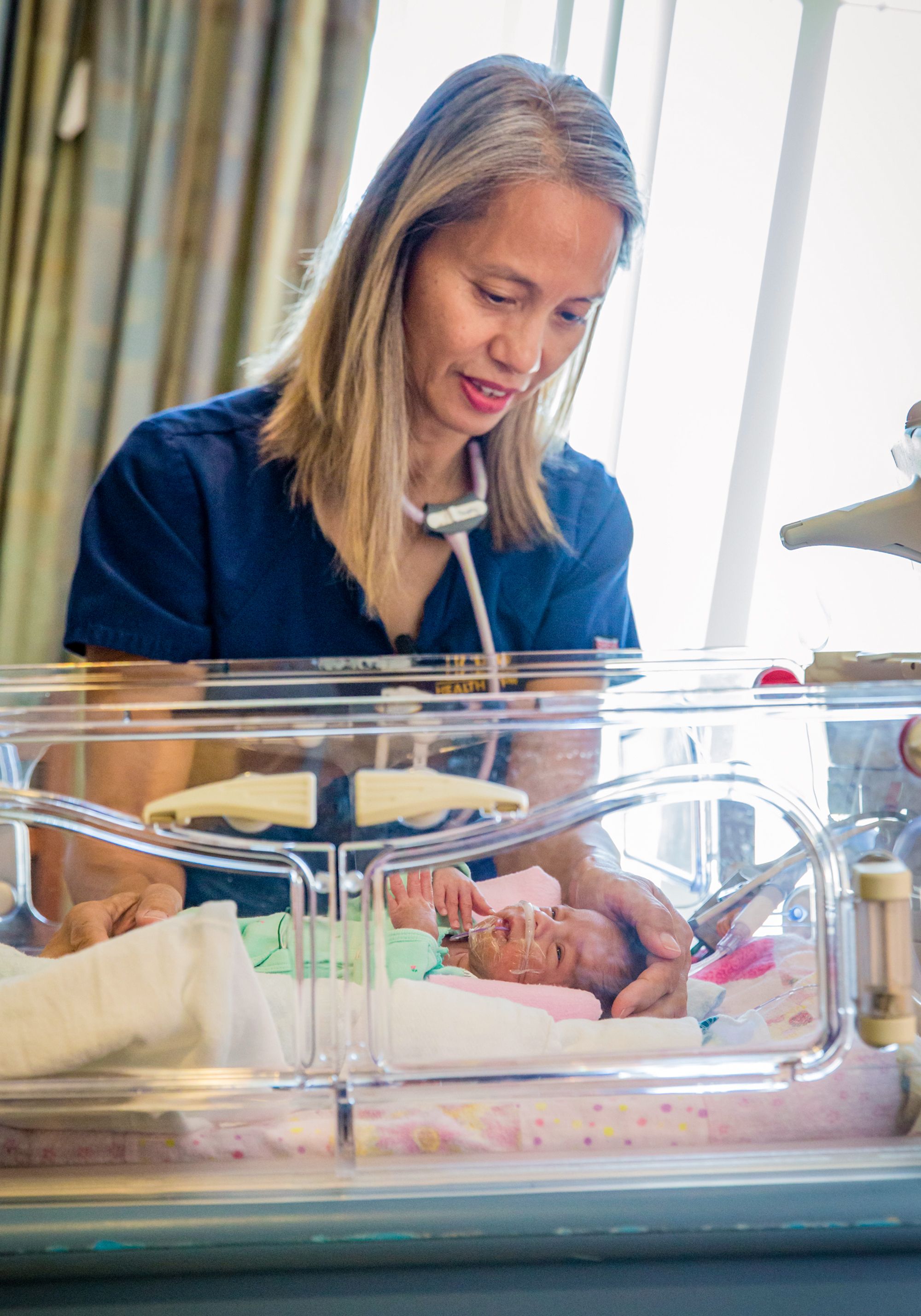 Preemie in the hospital with nurse