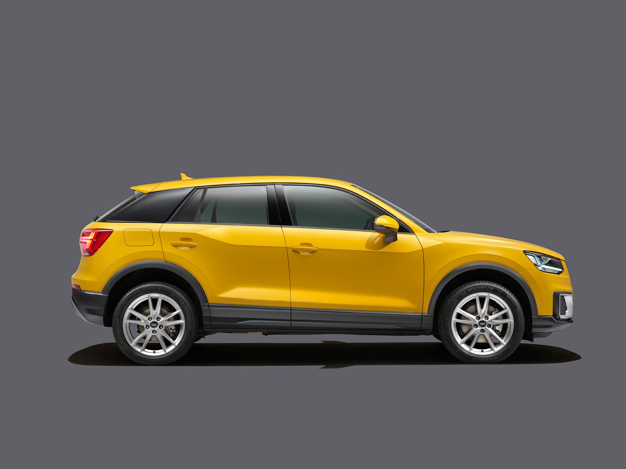 1audi_q2_profile_yellow_main_comp_v1